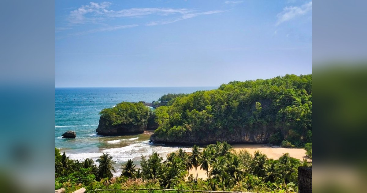 Beautiful tropical beach resort in Guam with clear ocean water and palm trees