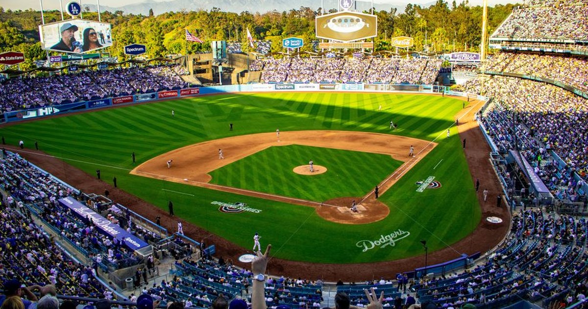 baseball fans cheering inside stadium stands